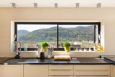 Unleash the Beauty of Natural Light with Ravi Double Glazing Ltd's Aluminum Windows.